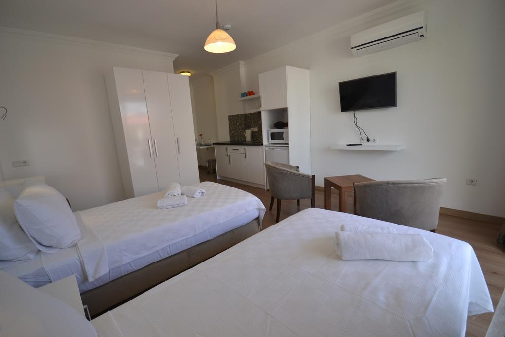 Kelebek Studio Apartments Kalkan Zimmer foto